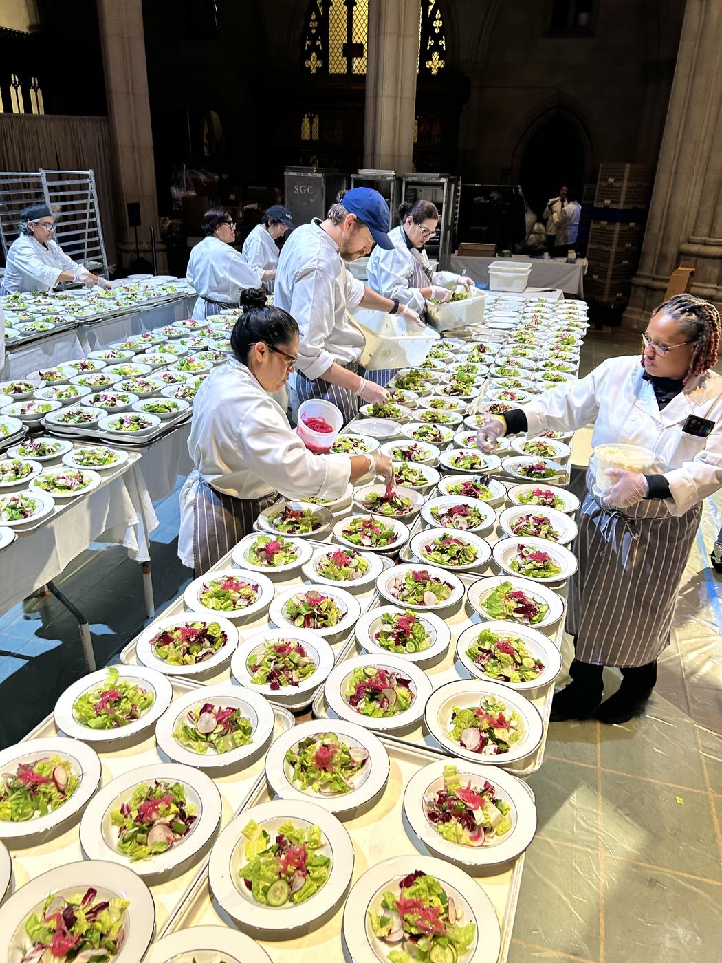 Chefs and pantry team plating courses